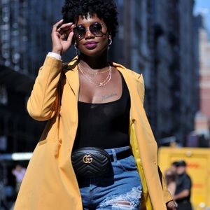 Gucci GG Marmont matelassé leather belt bag.